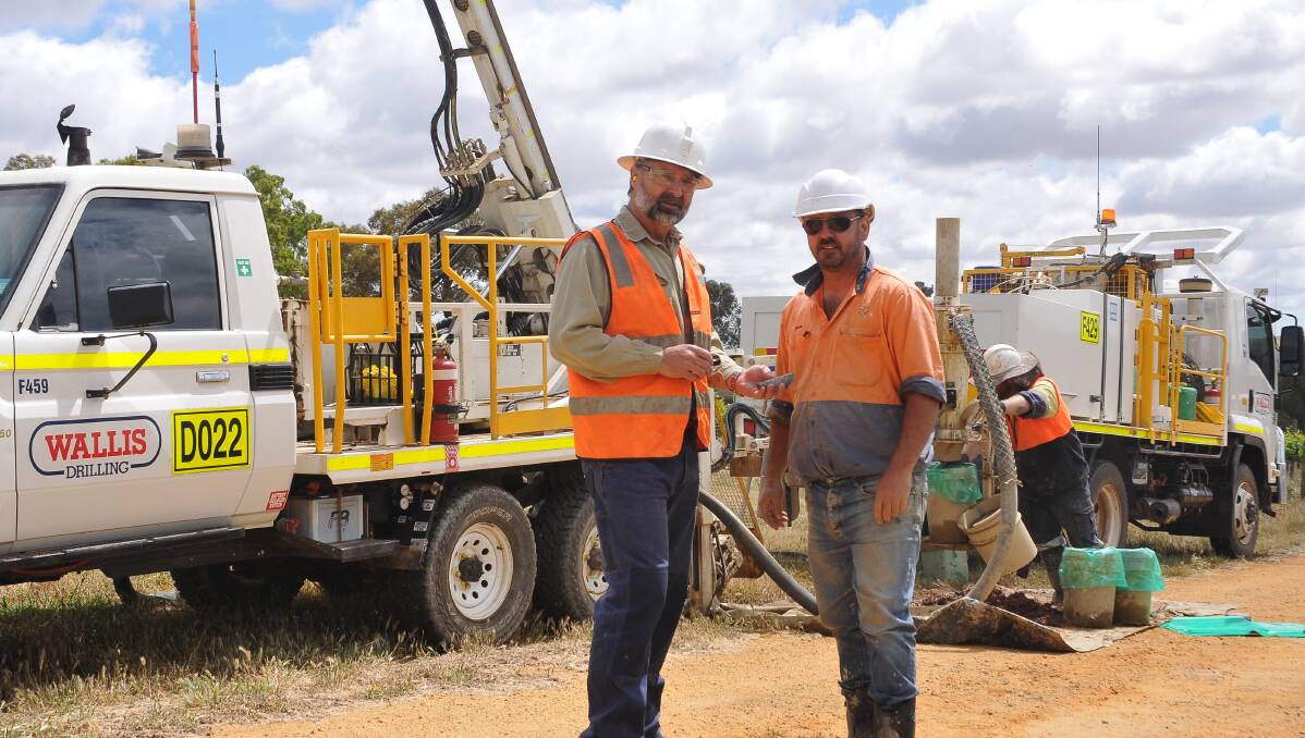 Navarre Minerals managing director Geoff McDermott and geologist Shane Mele with gold drilling samples from the Irvine Prospect in 2016. Photo: Anthony Piovesan