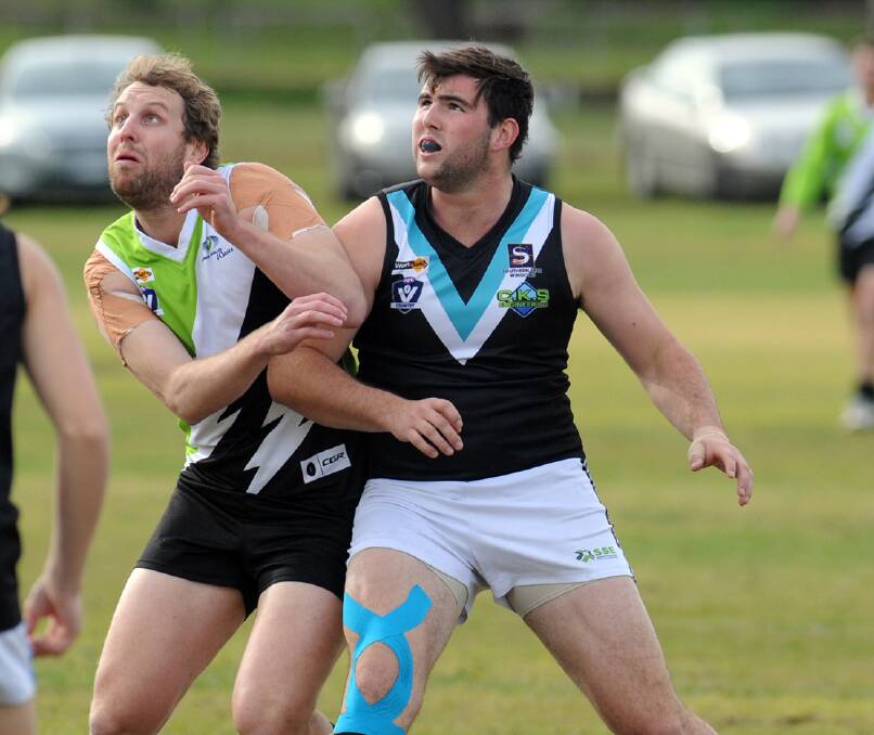 EYES ON THE BALL: Swifts Matthew Healy fights for possession against Jeparit-Rainbow's Sam Cranna in round 12. Picture: PAUL CARRACHER 