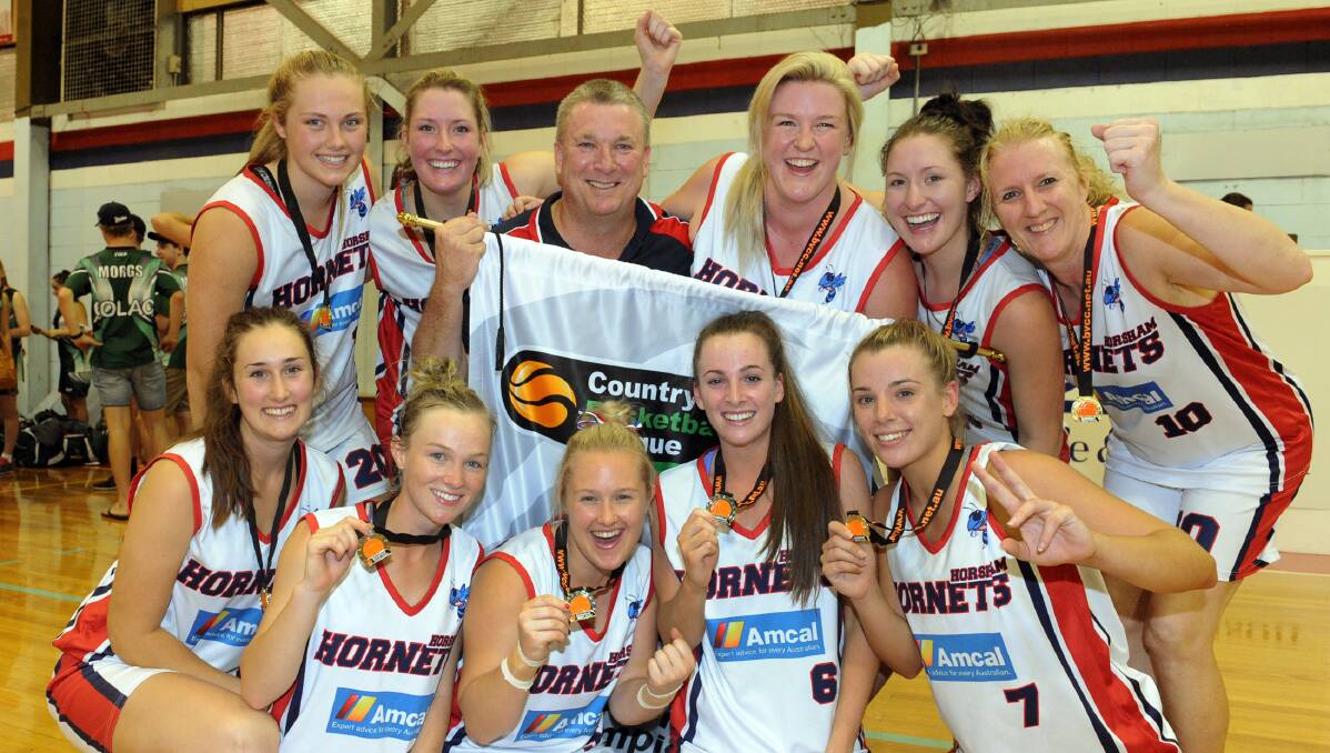 WINNERS: Lady Hornets after their 2016 grand final win. Picture: PAUL CARRACHER