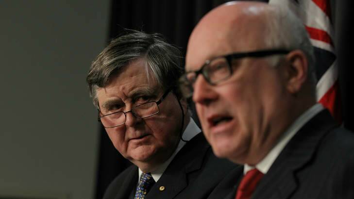 Attorney-General George Brandis, right, and ASIO chief David Irvine argue enhanced powers are needed to combat terorrism. Photo: Alex Ellinghausen