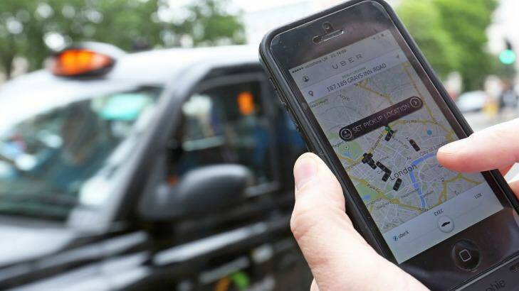 A user scans for an available vehicle using Uber. Photo: Chris Ratcliffe