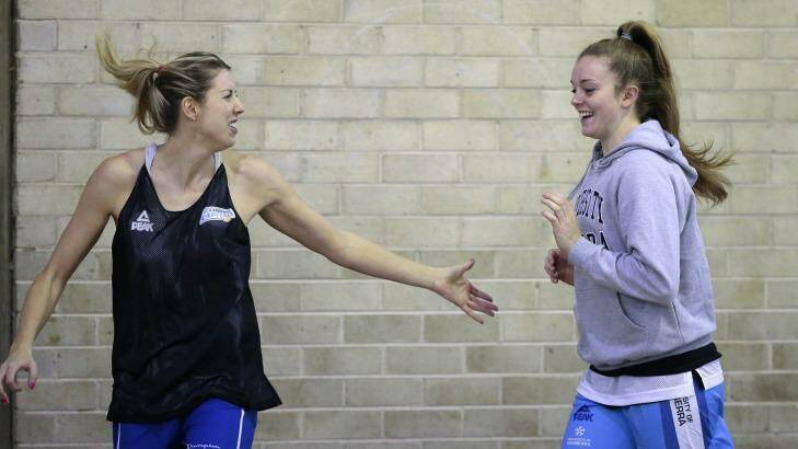 Canberra Capitals' Carly Wilson, left, and Abbey Wehrung at training. Photo: Jeffrey Chan