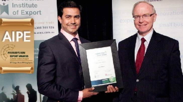 AIPE chief executive Amjad Khanche accepting an award from the NSW government. Photo: AIPE