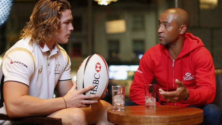 The ambassadors: Wallabies forward Michael Hooper, the newest Test captain, gets some tips from retired halfback George Gregan, the most-capped leader of the national team.