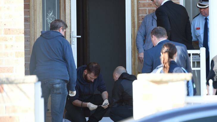 Police at the scene of one of the terror raids in Sydney. Photo: Nick Moir