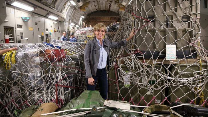 Foreign Affairs Minister Julie Bishop inspects Australian aid supplies on board a C17 bound for Vanuatu. Photo: Andrew Meares