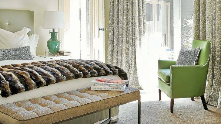 Diane Bergeron creates a refuge by choosing cool jade as the accent colour teamed with a fur throw and handy buttoned bench. Photo: Bill Farr