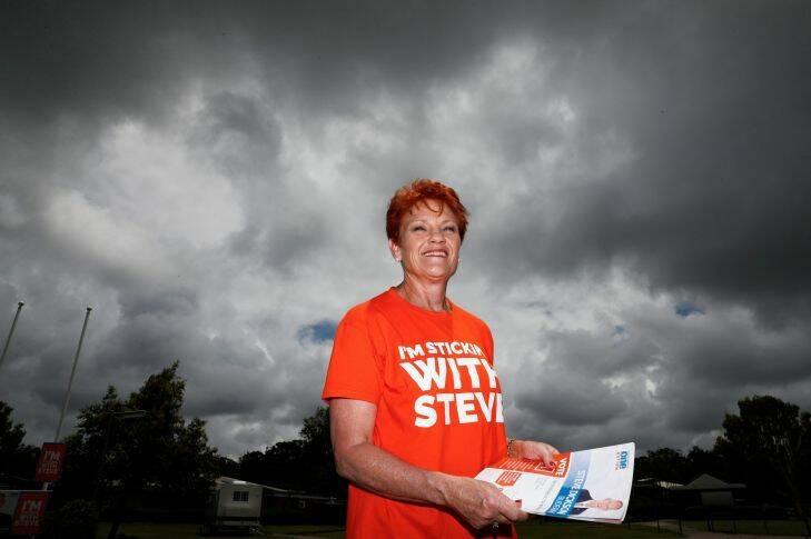One Nation Leader Senator Pauline Hanson hands out how to vote cards at the polling booth set up at the Mountain Creek State School in Buderim during the Queensland state election on Saturday 25 November 2017. fedpol Photo: Alex Ellinghausen