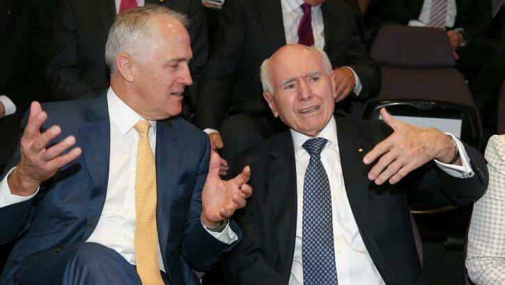 Mutual admiration: Mr Turnbull with former prime minister John Howard during the launch of the John Howard Walk of Wonder at science and technology centre Questacon in Canberra on Tuesday. Photo: Alex Ellinghausen