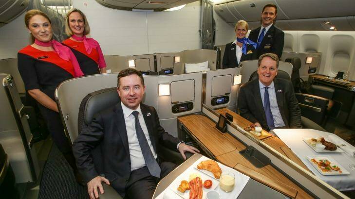 Qantas CEO Alan Joyce with American Airlines Chairman and CEO Doug Parker in First Class of the new B777-300ER aircraft. Photo: Dallas Kilponen