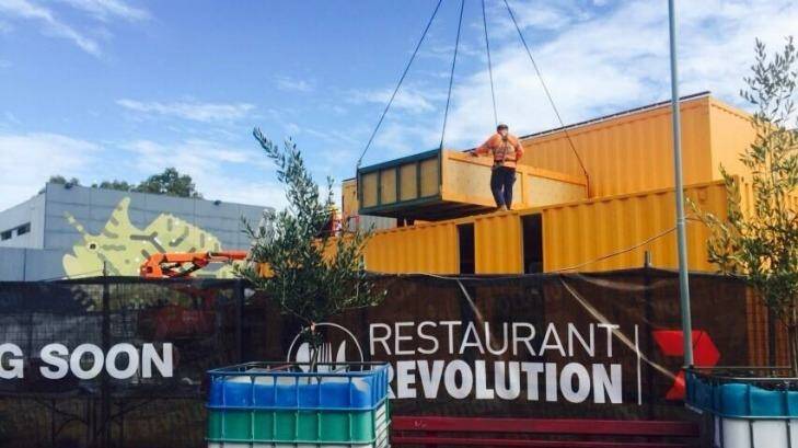 Shipping containers have been craned in to the Oxford Street site. Photo: Restaurant Revolution / Facebook