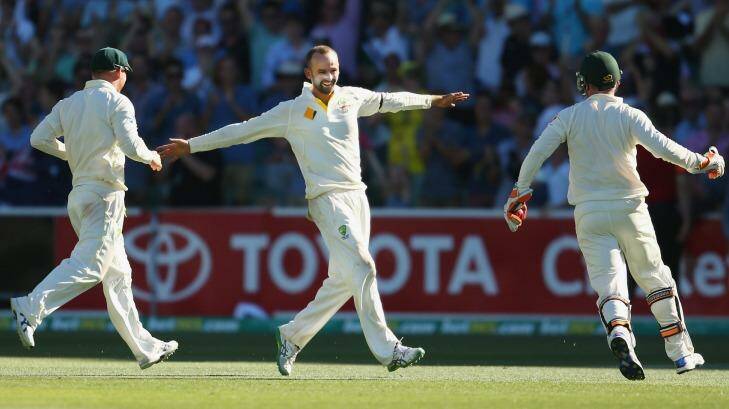 Memorable win: Nathan Lyon celebrates after the final wicket in Adelaide last year. Photo: Getty Images 