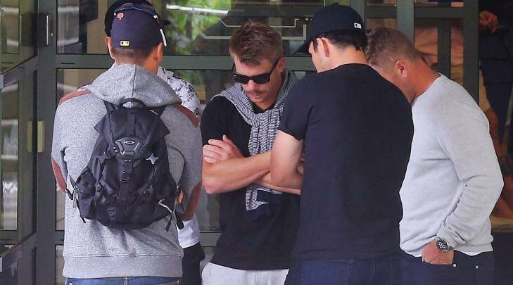 In shock: players outside the hospital following Hughes' death.  Photo: Joosep Martinson/Getty Images`