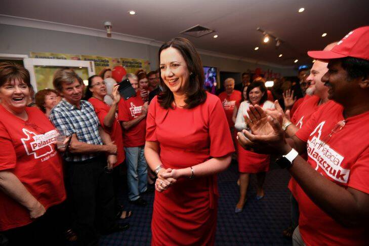 Queensland Premier Annastacia Palaszczuk is greeted by supporters as she arrives to an election night function at the Oxley Golf Club in Brisbane, Saturday, November 25, 2017. Queenslanders voted today in the state's election. (AAP Image/Dan Peled) NO ARCHIVING