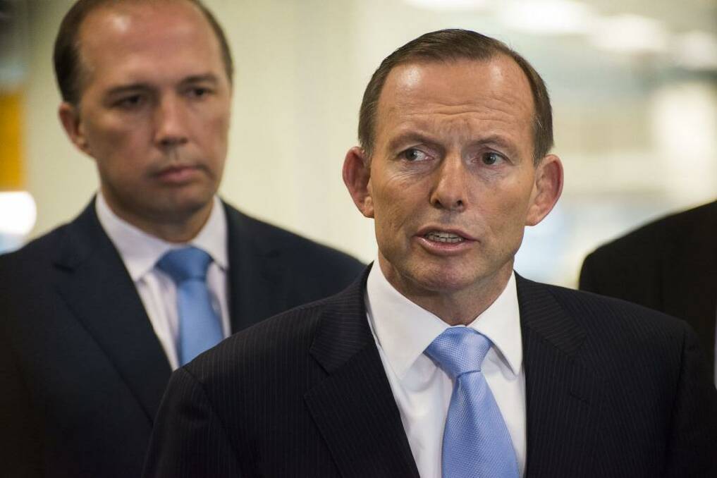 Prime Minister Tony Abbott has called on Liberal Party members to stay and fight for reform.  Photo: Christopher Pearce