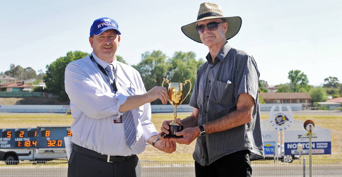 A CUP WIN: Stawell Harness Racing Club president Geoff Sanderson with Narra Operative owner Kevin McIntyre after his charge won the last Stawell Pacing Cup.