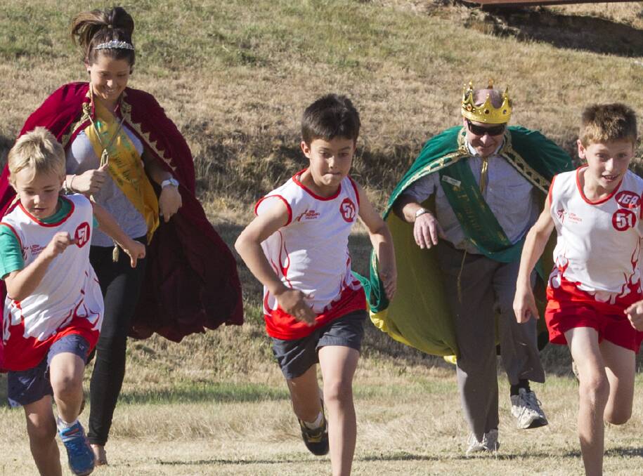 A SPORT FOR KINGS: King and Queen of the 2014 Ararat Golden Gateway Festival, Derek Pope and Meg White, joined in the fun on the field with Little Athletics last year. 