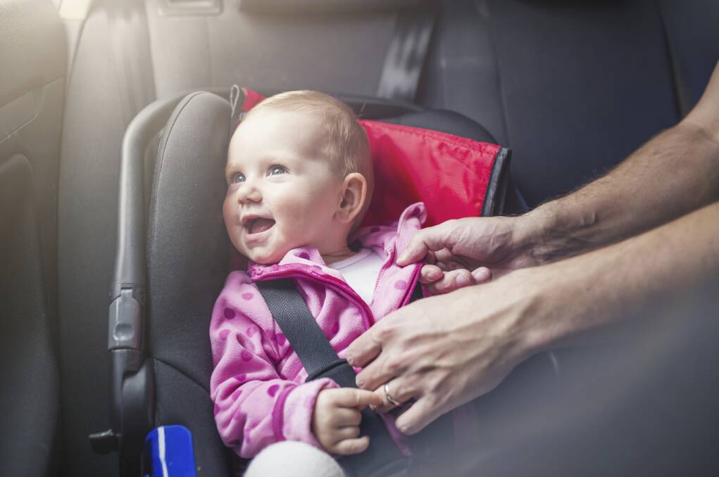 FIT IT RIGHT: Professionals are on hand to make sure your baby seats are fitted correctly to keep your children safe in crashes. 