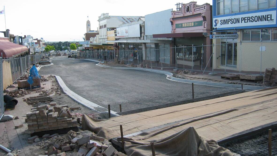 One of four pedestrian crossings that exist in the short length of the Main Street takes shape in 2003.