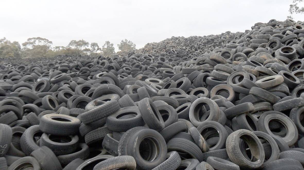 Tyres for as far as the eye can see litter the former site of Motorway Tyres on the Western Highway in Stawell. 