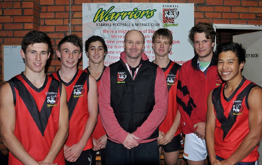 Stawell Westlift Warriors coach, Brad Cassidy, has shown plenty of faith in his young brigade this season, elevating a number of juniors to play senior football. Cassidy (centre) is pictured with youngsters L-R Ben Taylor (making his debut tomorrow), Mitch Collins, Sam Williams, Michael Hackwill, Liam Scott and Jarrod Illig. Picture: GRACE BIBBY.