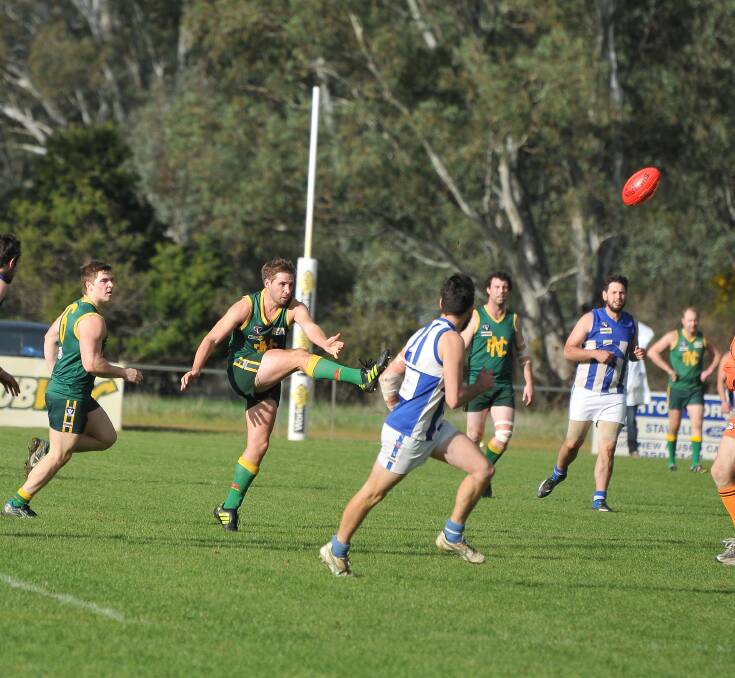 Nic Murphy finds space and launches Navarre back into attack during its massive 98 point defeat of Newstead at Navarre last Sunday. Picture: MARK McMILLAN