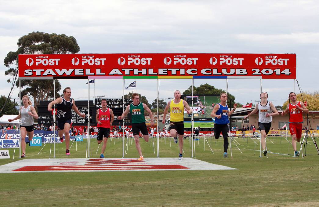Paralympian gold medalist, Evan O'Hanlon (second from left) wins the XXXX Gold Chris Perry Memorial Backmarkers Invitation 120 metres Handicap. Picture: KERRI KINGSTON