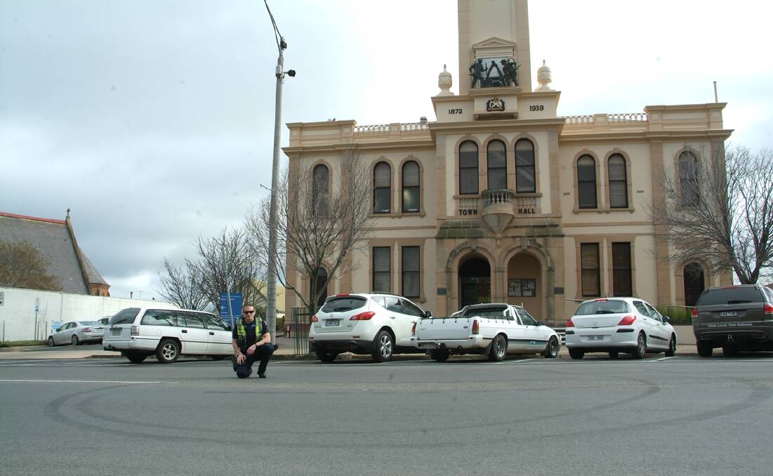 First Constable Nathaniel Warren at the scene of the hoon driving in Stawell's Main Street. Picture: BEN KIMBER