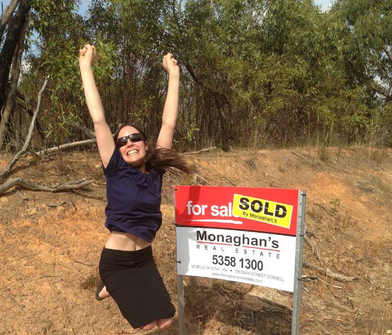 Carlee Vokes celebrates the purchase of her home. 