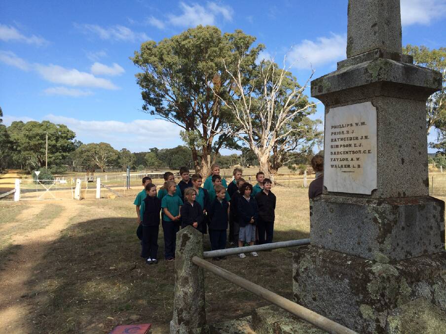 Concongella students L-R (back) Ryder, Cody, Tyler, Abbey, Axylle, Thomas; (centre) Lia, Swayde, Charlie, Kyle, Jesse, Joshua; (front) Sarah, Deegan and Sasha at the Concongella Cenotaph to commemorate Anzac Day.