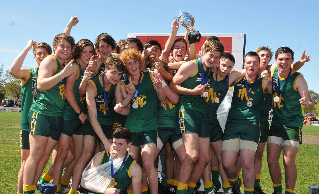 Navarre's under 17s celebrate their premiership in the Maryborough Castlemaine District Football League. Picture: MARK McMILLAN