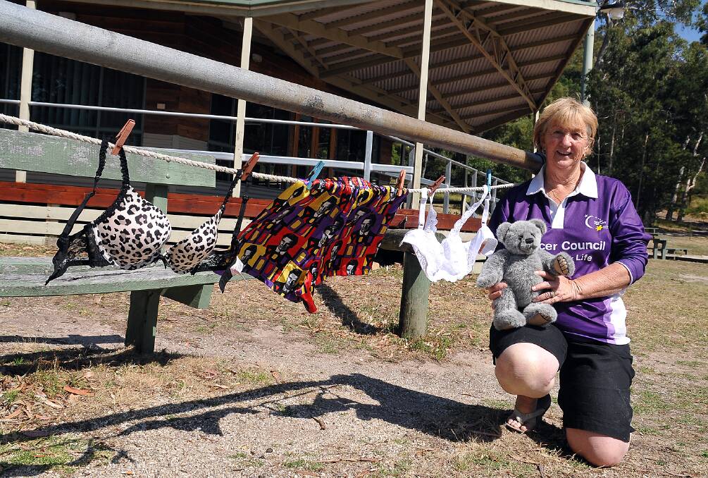 Marianne Mitchell with some of the bras, boxer shorts and bears that she will surround the Halls Gap Oval with as part of the Relay for Life fundraiser. Picture: KERRI KINGSTON.