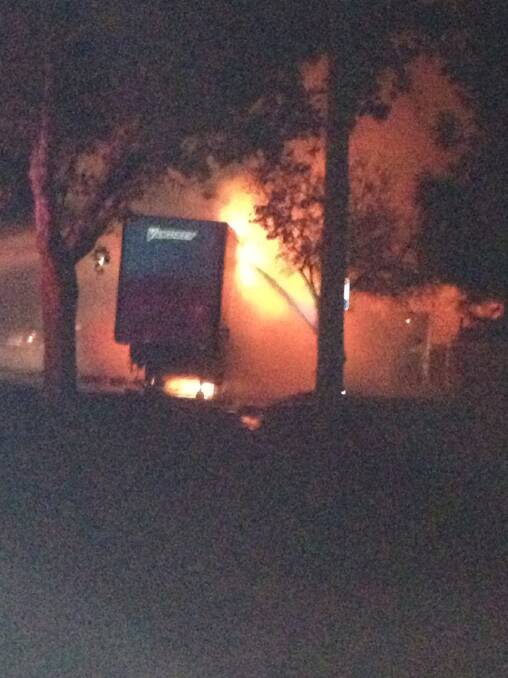 Lauren Toomey captured the moment one of the trailers on the trucks was engulfed by flames. 
