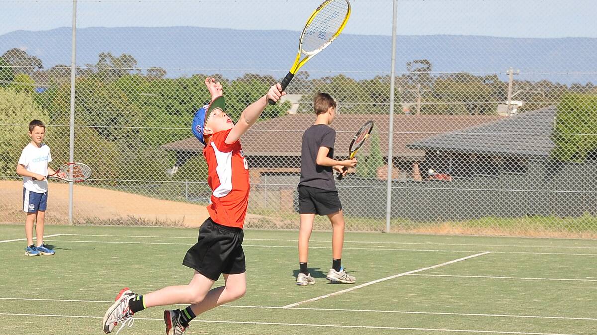 Stawell Tennis Club’s junior competitions swung into action last Saturday and youngster James Brown (above) was showing some early desperation to make this return shot. James and his Murray team were in early form with a strong win in the opening C grade match of the season. Picture: MARK McMILLAN