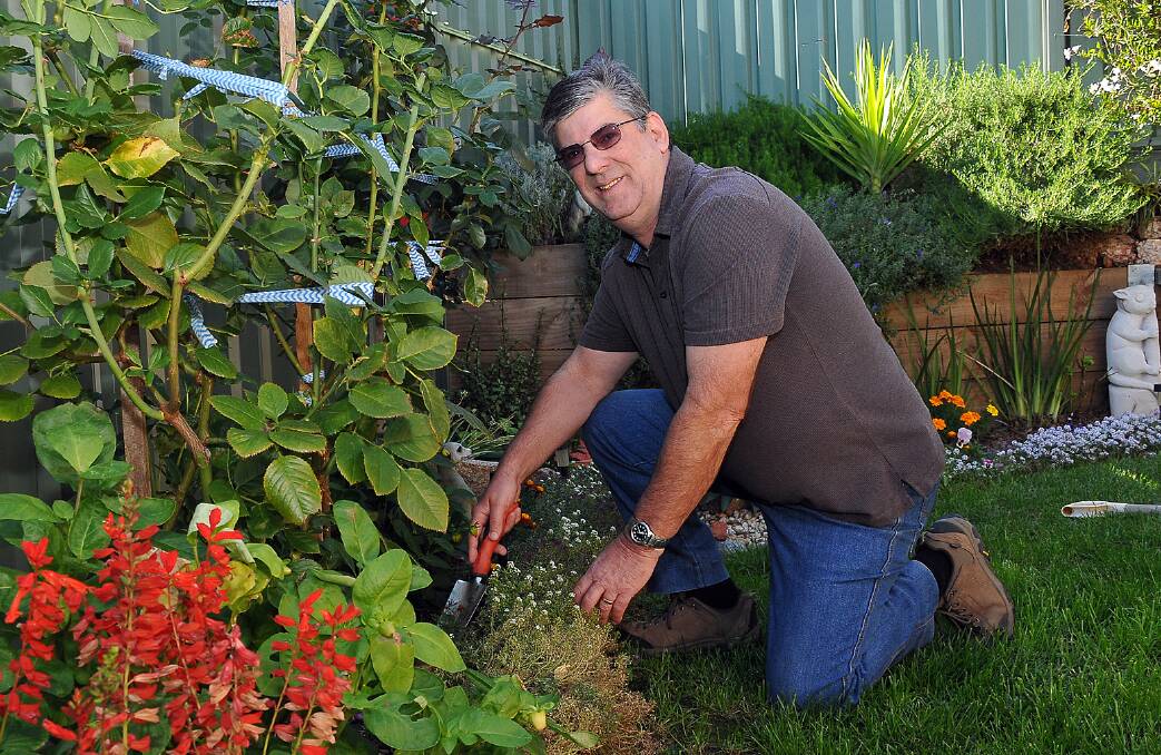 Michael Joynson is pictured in his garden, which has won him the state award in the ‘Victoria in Bloom’ competition, conducted by the Department of Human Services. Picture: KERRI KINGSTON.