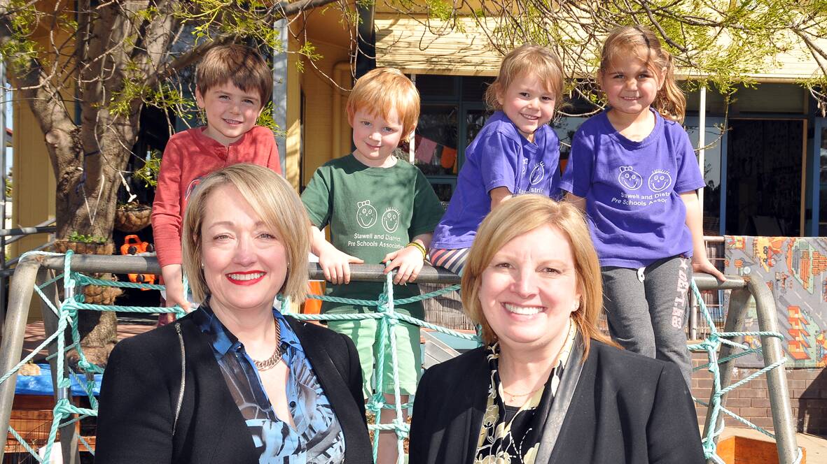 Liberal candidate for Ripon, Louise Staley and Minister for Children and Early Childhood Development, Wendy Lovell, pictured in the outside play area with (back) L-R Tom, George, Tess and Kelanee after the announcement of significant funding for upgrades at Stawell’s Cooinda and Marrang Kindergartens. Picture: MARCUS MARROW