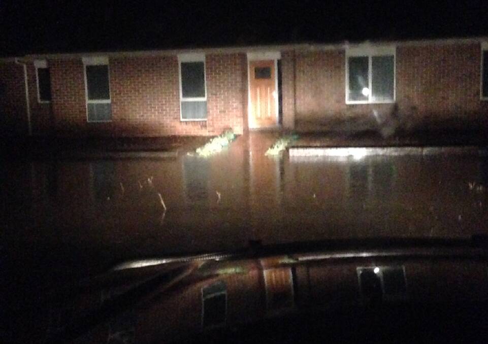 Great Western General Store owner Tracey McCartney captured this image of the floodwater as it lapped at the front door of a home in Great Western.