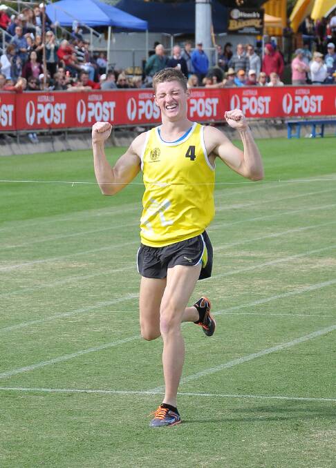 Ash Cowen hits the finishing line a winner in the Victory Restricted
1600 Metres Handicap. Picture: MARK McMILLAN.