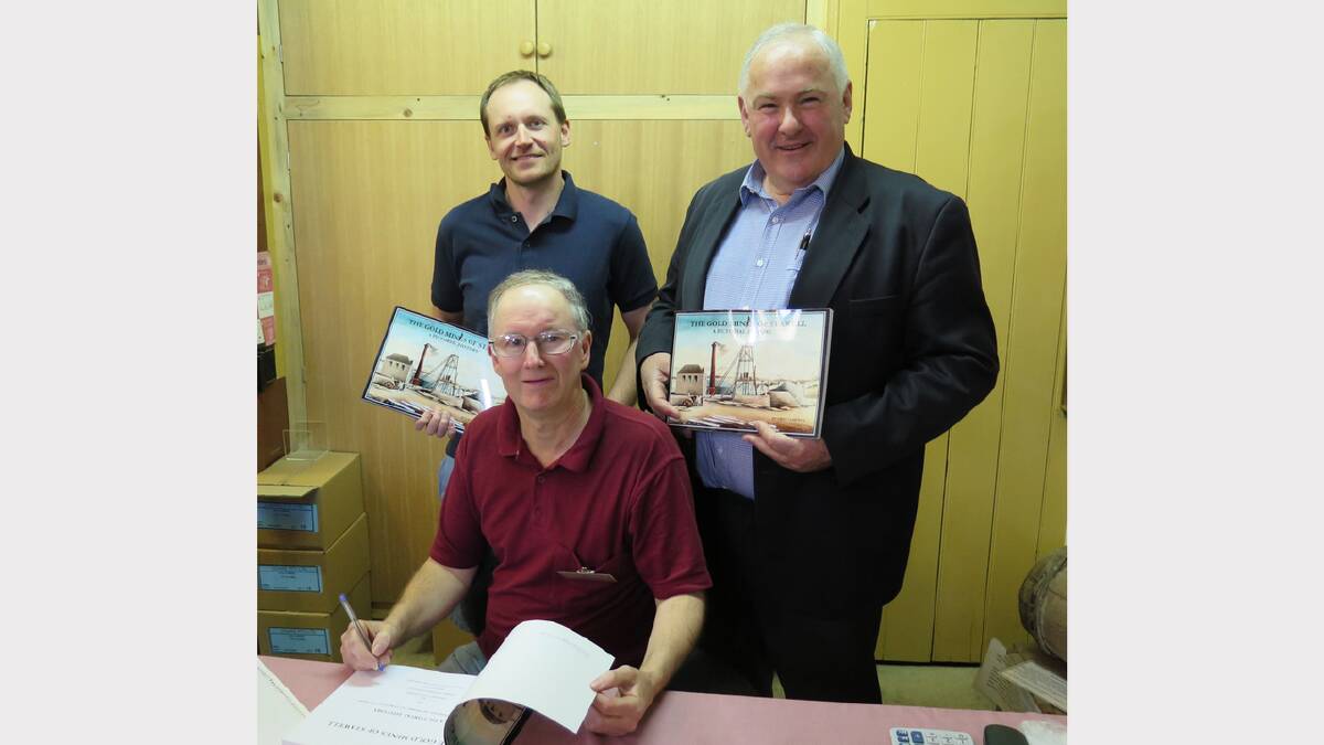 Stawell Gold Mines representative David Coe, Mayor Cr Kevin Erwin and author Treg Cameron at the book launch.