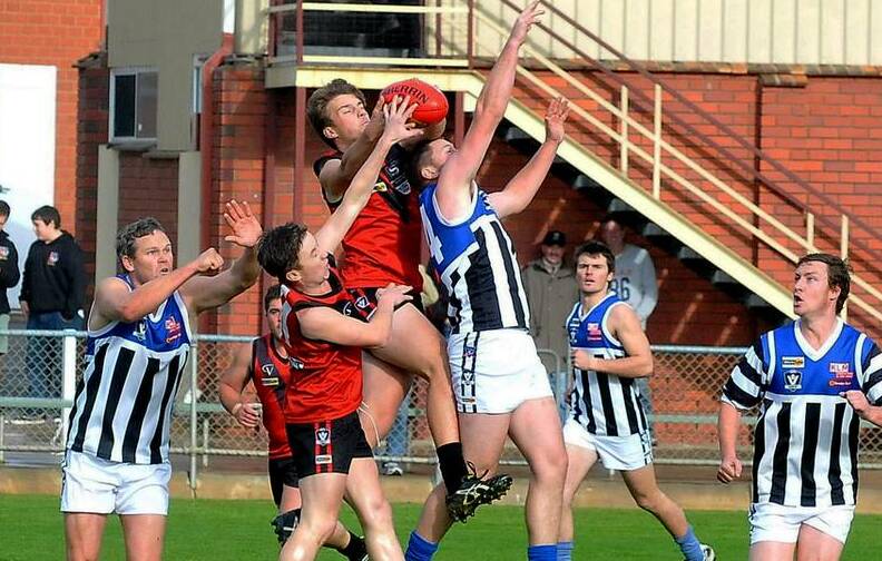 Stawell Warriors youngster Liam Scott takes a strong pack mark during the clash against Minyip Murtoa on Saturday at Central Park.