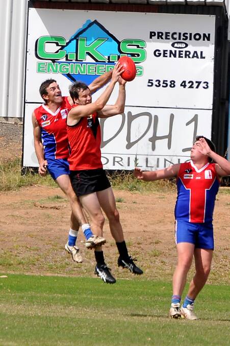 Stawell full forward Brenton Potter takes a strong grab in front of his St Arnaud opponent in Saturday’s practice match at North Park. Potter was among the better performers in what was a solid hitout for the new look Warriors team. Picture: MARK MCMILLAN.