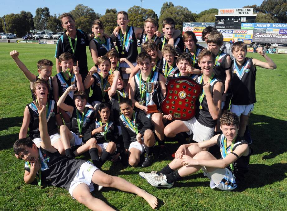 CKS Swifts under 14s pictured celebrating their premiership