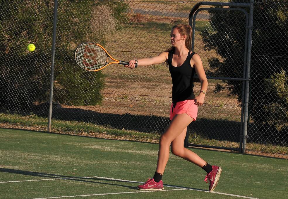 Brianna Hyslop in action during the Stawell Friday night tennis competition. Picture: Mark McMillan