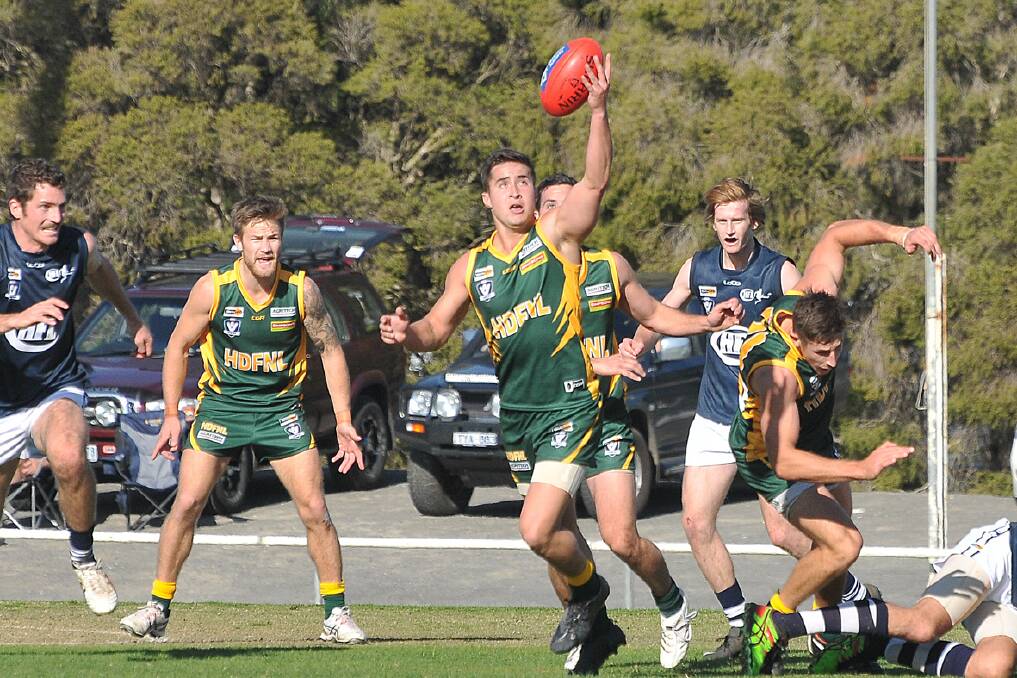 Sean Mantell reaches for this high ball on the run in Horsham District's interleague clash against Central Highlands last weekend. Picture: Mark McMillan