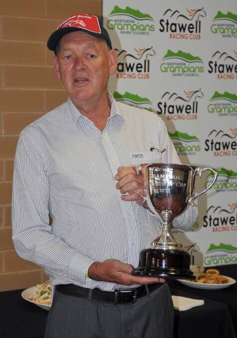 Geoff Watts proudly shows off the Grampians Halls Gap Cup. Picture: Kerri Kingston