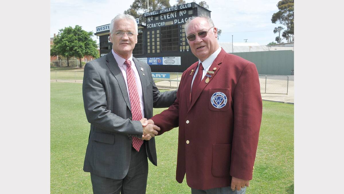 Minister for Sport and Recreation Damian Drum, congratulates Stawell Athletic Club president Trevor Skurrie as they work together to shore up the future of the Stawell Gift.