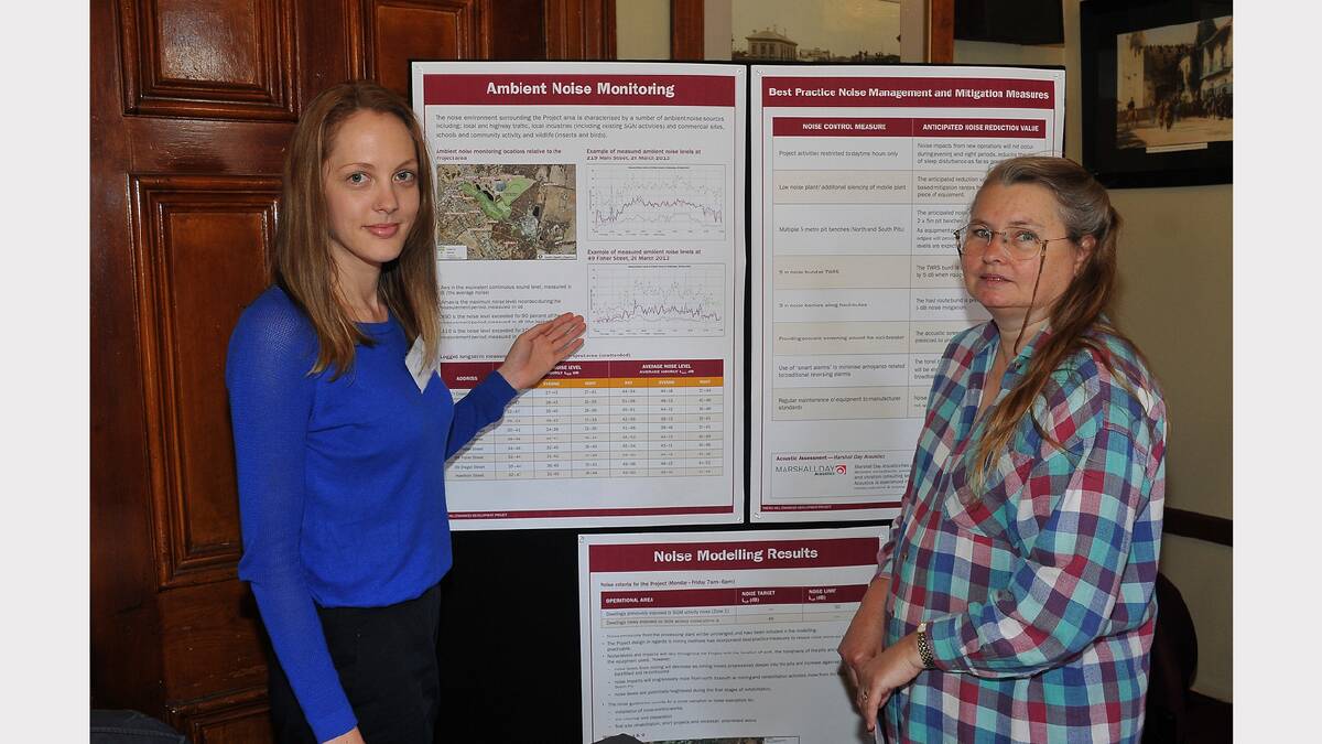 Gillian Lee discusses information about the Big Hill Enhanced Development Project with Deb Clarke at the information day.