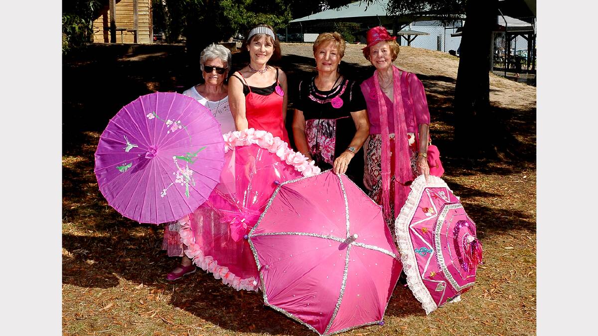 Pictured complete with their pink umbrellas are pink outfits are jazz enthusiasts (L-R) Irene Millar, Elizabeth Harvey, Jan Horne and Elspeth Coote. Picture: MARK McMILLAN. 