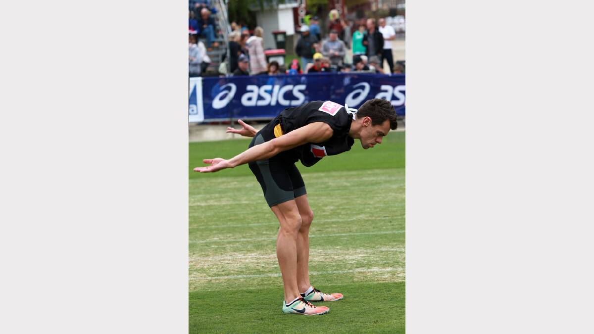 Shane Woodrow was going through his warm up routine before walking to the starting blocks in his heat of the Australia Post Stawell Gift.