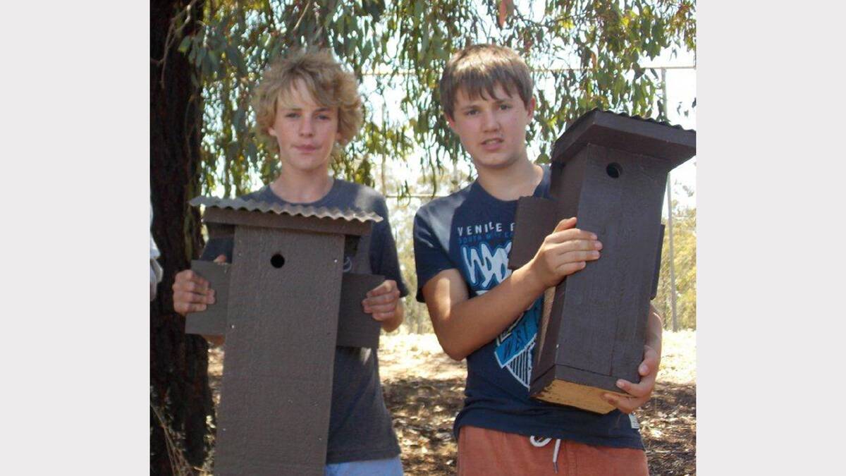 Byron Grinham and Jayden McCartney with their completed nest boxes.